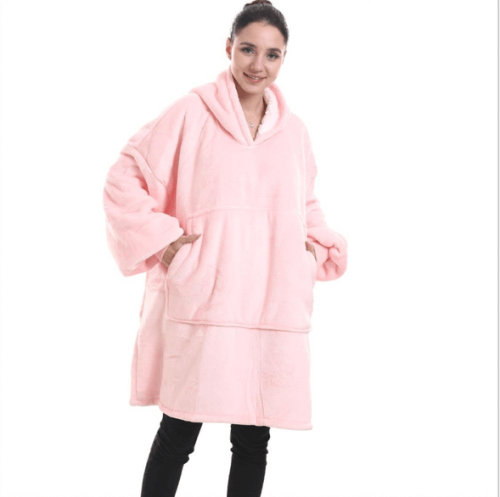 Oversized Wearable Blanket for Ultimate Warmth & Comfort in soft pink, featuring cozy Sherpa lining.